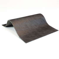 Détail de la chaise rembourrée en cuir et tissu